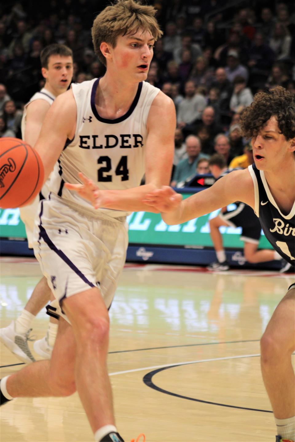 Elder senior Carson Browne looks for an opening as Elder defeated Kettering Fairmont 53-44 in an OHSAA Division I boys basketball district championship game March 4, 2023 at University of Dayton Arena.