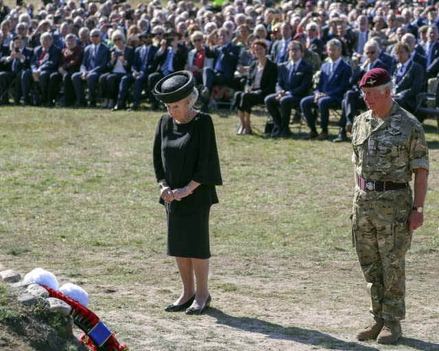 Prince Charles attends a commemorative service and wreath-laying with Princess Beatrix of The Netherlands 