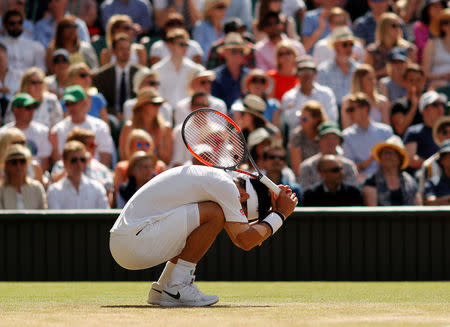 Tennis - Wimbledon - All England Lawn Tennis and Croquet Club, London, Britain - July 11, 2018 Japan's Kei Nishikori reacts during his quarter final match against Serbia's Novak Djokovic REUTERS/Andrew Couldridge