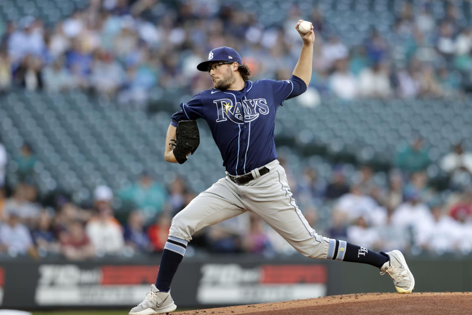 Tampa Bay Rays starting pitcher Josh Fleming works against the Seattle Mariners during the first inning of a baseball game Saturday, June 19, 2021, in Seattle. (AP Photo/John Froschauer)