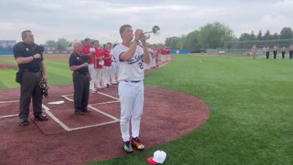 Grove City senior baseball player Ethan Weaver plays national anthem on trumpet