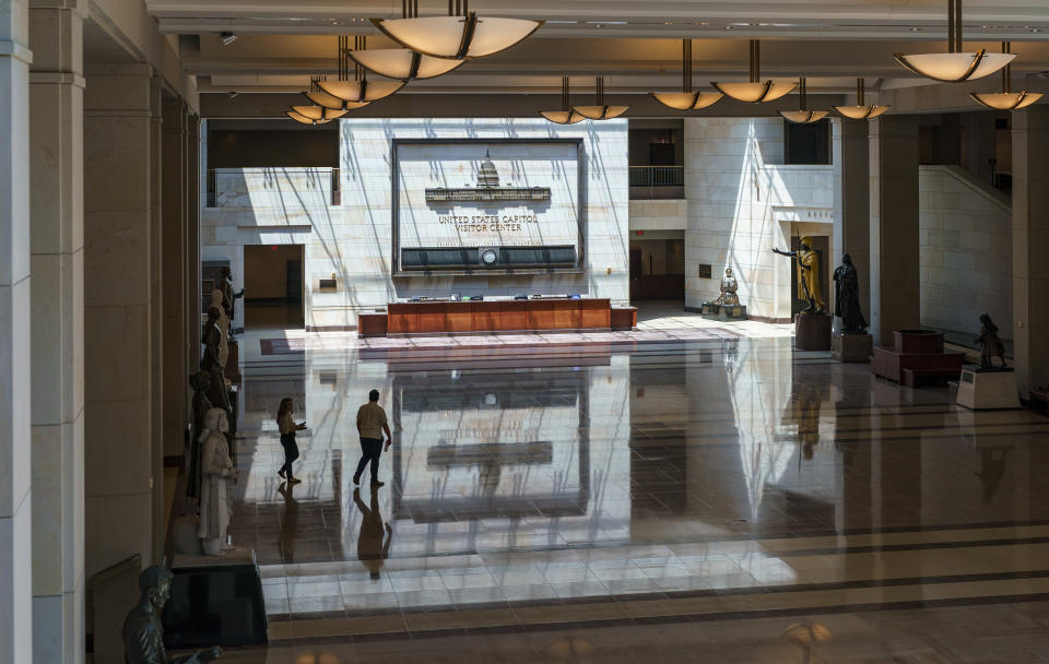 This June 29, 2021, photo shows the empty U.S. Capitol Visitor Center, closed since the COVID-19 shutdown in early 2020, is seen at the Capitol in Washington. (AP Photo/J. Scott Applewhite)