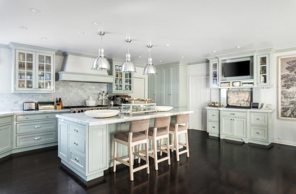 The kitchen is spacious and kitted out with high-end fixtures. Paul Barnaby