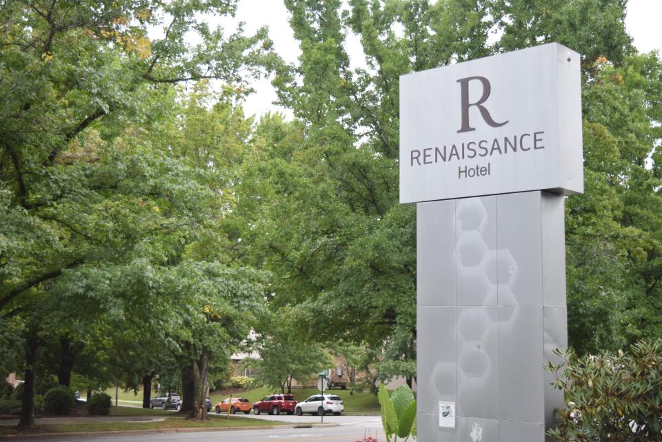 A reader who noticed a missing honeycomb pattern on the sign of the Renaissance Hotel wonders whether the hotel's bees are "bee-gone."