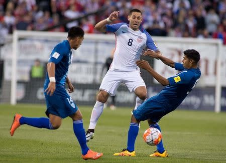 United States forward Clint Dempsey (8) is fouled by Guatemala defender Moises Hernandez (5) in the first half of the game during the semifinal round of the 2018 FIFA World Cup qualifying soccer tournament at MAPFRE Stadium. Trevor Ruszkowski-USA TODAY Sports