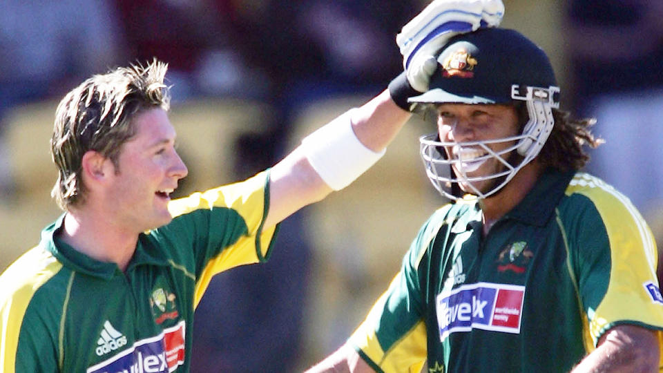 Pictured left to right, former Australian cricket teammates Michael Clarke and Andrew Symonds.