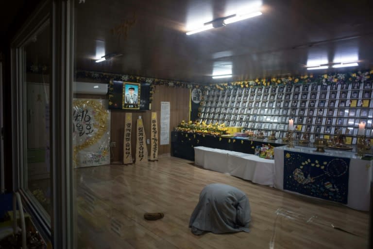 A monk prays at a memorial to the 304 victims, mainly schoolchildren, of the Sewol ferry disaster