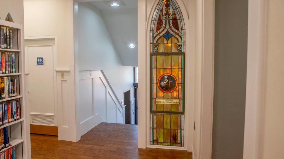 Wider doorways and better lighting were part of the renovation at Louis Latzer Library in Highland, plus a stained-glass window from the former Hope Lutheran Church was incorporated into the renovation.