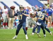 Oct 23, 2016; London, United Kingdom; Los Angeles Rams quarterback Case Keenum (17) of the recovers a fumble and looks downfield to pass against the New York Giants during the second quarter of the game at Twickenham Stadium. Mandatory Credit: Steve Flynn-USA TODAY Sports