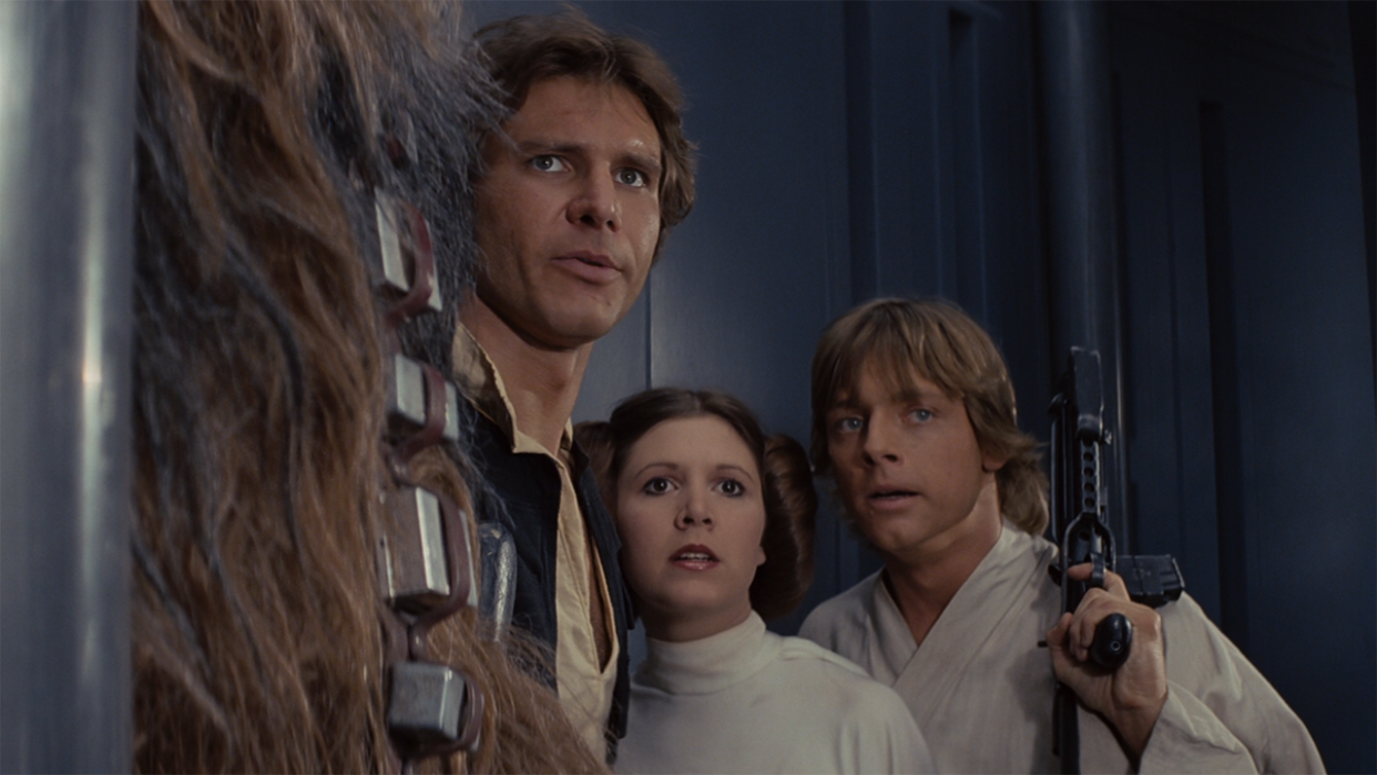  Harrison Ford, Carrie Fisher, and Mark Hamill wandering around the Death Star together in Star Wars. 