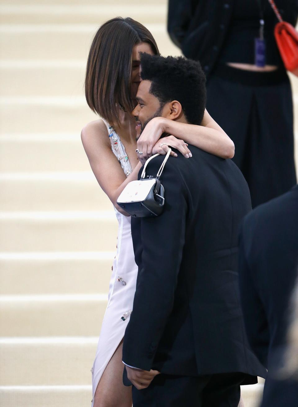 Selena Gomez and The Weekend made their relationship official at the 2017 Met Gala, posing for several adorable couple photos.