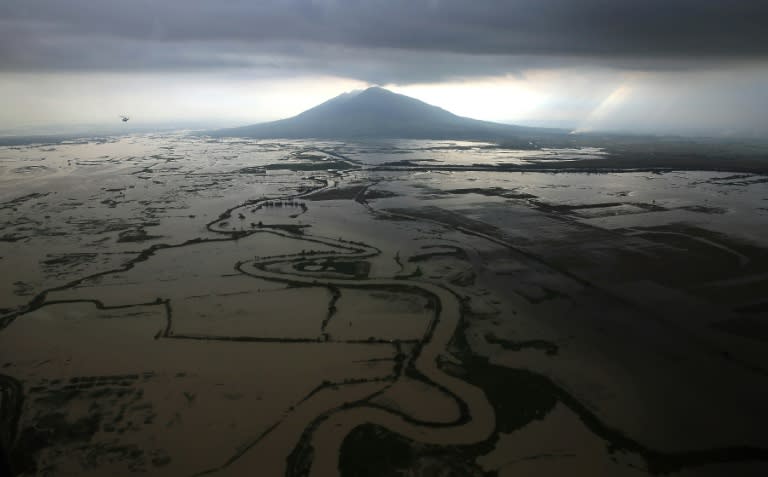 A Malacanang Photo Bureau aerial shot of flooded rice fields and farmland in Pampanga province, north of Manila on October 22, 2015