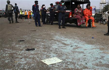 A piece of paper lies on the ground at the scene of a bomb blast explosion at Nyanyan, Abuja April 14, 2014. REUTERS/Afolabi Sotunde