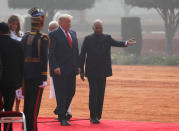 U.S. President Donald Trump and first lady Melania Trump are shown the way by India's President Ram Nath Kovind and Prime Minister Narendra Modi as they arrive for the ceremonial reception at the forecourt of India's Rashtrapati Bhavan Presidential Palace in New Delhi, India, February 25, 2020. REUTERS/Al Drago