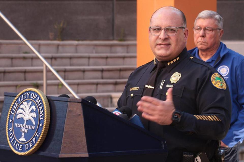 Mayor Francis Suarez, and Miami Police Interim Chief Manuel A. Morales, left, host a news conference to announce the arrest of a suspected serial killer outside the Miami Police Department headquarters in Miami, Florida on Thursday, December 23, 2021.