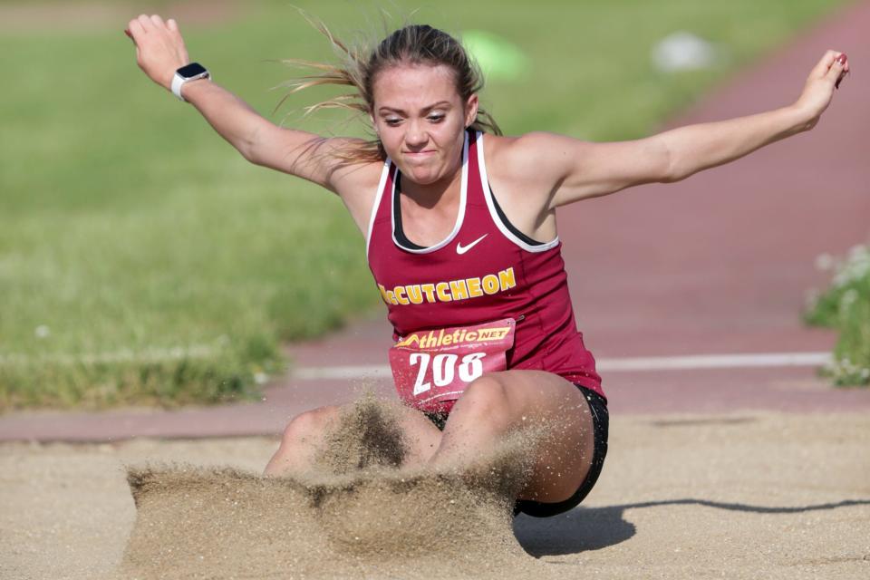 McCutcheon's Alexis Troxel competes in the long jump during the IHSAA Regional girls track meet, Tuesday, May 25, 2021 in Lafayette.