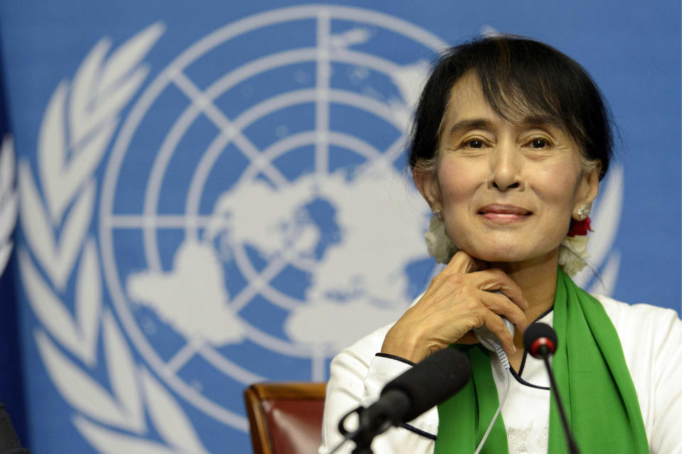 Myanmar opposition leader Aung San Suu Kyi attends a news conference during the annual meeting of the International Labour Organization (ILO) in Geneva, Switzerland, Thursday, June 14, 2012. Suu Kyi said that investment in her country should strengthen its nascent process of democratization. The Nobel peace laureate spoke Thursday to the annual meeting of the ILO in Geneva on the first stop of her trip to Europe. (AP Photo/Keystone, Laurent Gillieron)