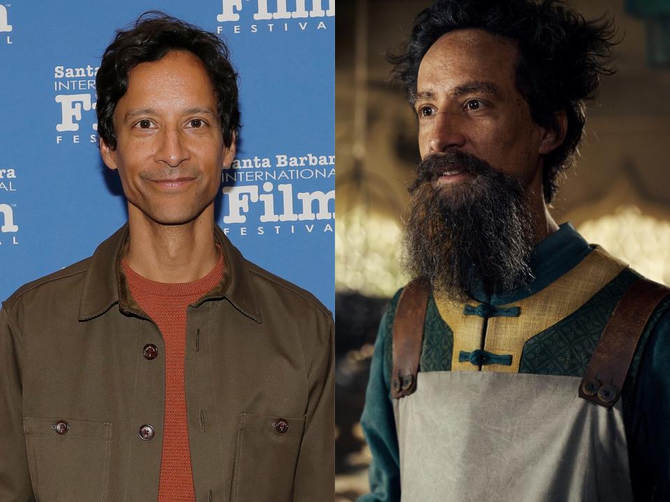 left: danny pudi in an orange sweater and brown jacket, smiling; right: pudi as the mechanist, wearing green clothes, an apron, with a disheveled black mustache beard and hair