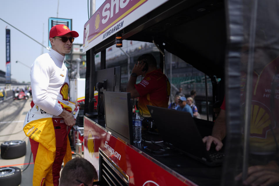 Josef Newgarden talks with crew before practice for the Indianapolis 500 auto race at Indianapolis Motor Speedway, Thursday, May 18, 2023, in Indianapolis. (AP Photo/Darron Cummings)