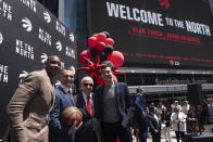 Toronto Raptors NBA basketball team new head coach Darko Rajakovic, center left, poses with team president Masai Ujiri, left, Maple Leaf Sports & Entertainment Ltd. President Larry Tanenbaum, center right, and Raptors general manager Bobby Webster pose following a media availability in Toronto on Tuesday, June 13, 2023. (Chris Young/The Canadian Press via AP)