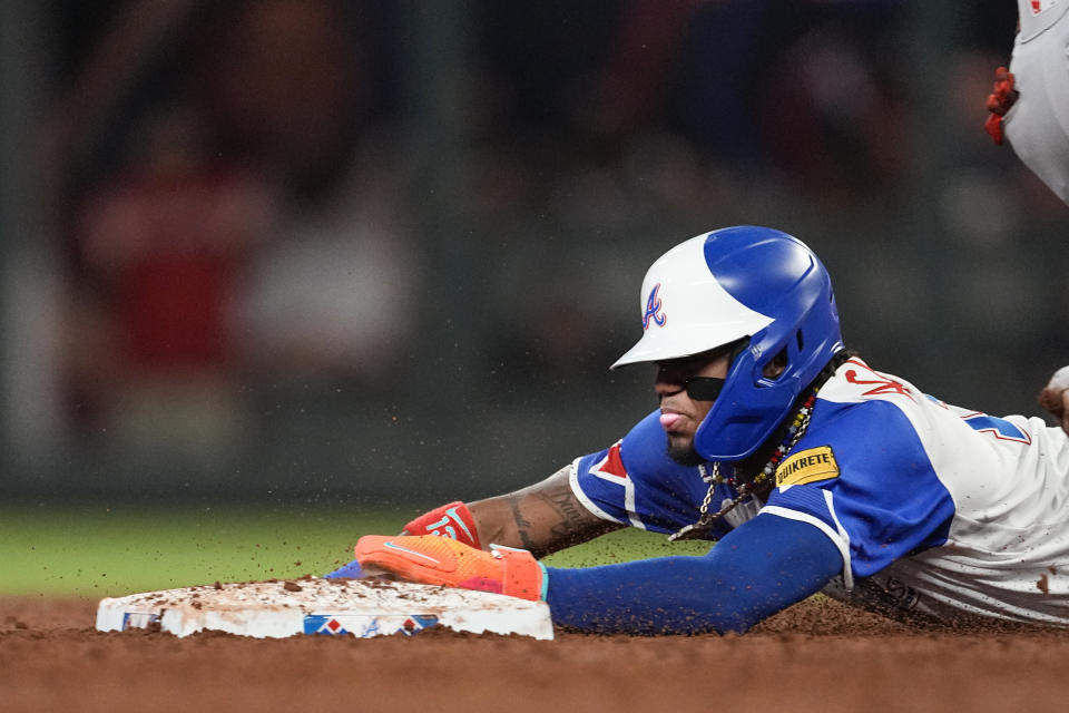 Atlanta Braves' Ronald Acuna Jr. steals second base in the third inning of a baseball game against the Washington Nationals, Saturday, Sept. 30, 2023, in Atlanta. (AP Photo/John Bazemore)