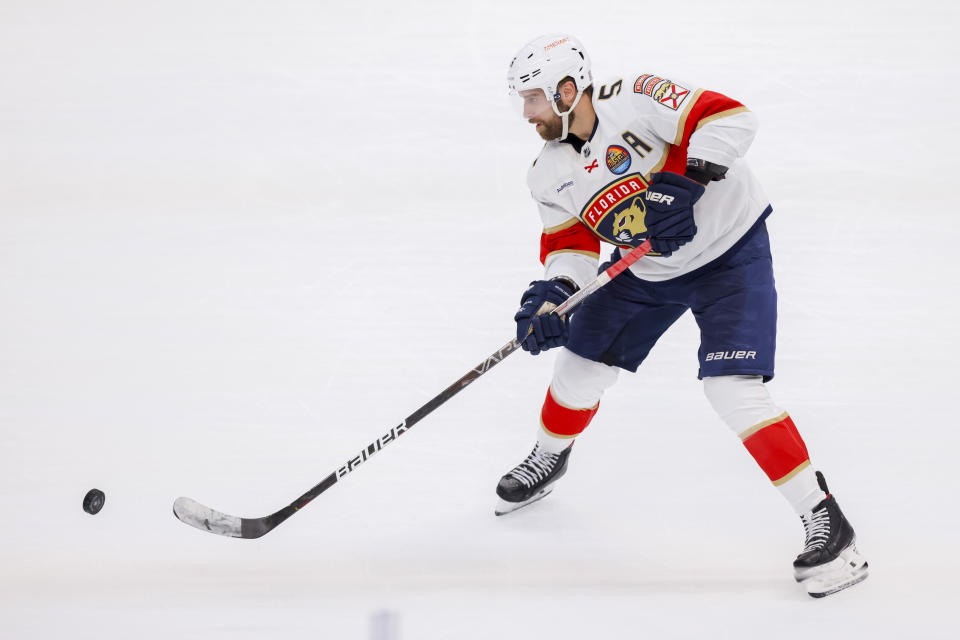 Florida Panthers defender Aaron Ekblad passes in the second period of an NHL hockey game against the Dallas Stars in Dallas, Sunday, Jan. 8, 2023. (AP Photo/Gareth Patterson)