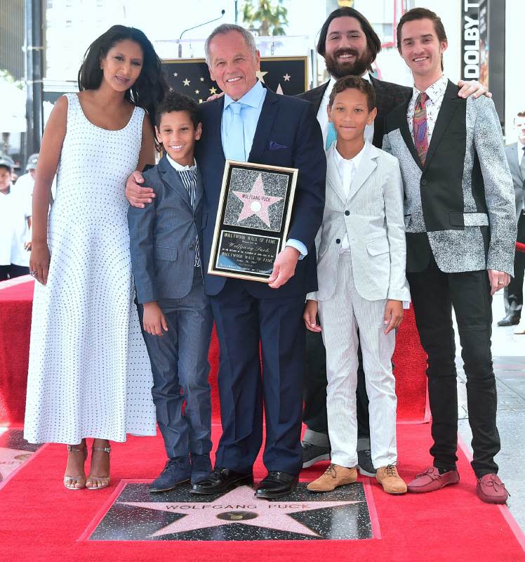 Wolfgang Puck, wife Gelila Assefa Puck and sons<p>FREDERIC J. BROWN/AFP via Getty Images</p>