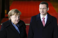 Poland's Prime Minister Mateusz Morawiecki welcomes Germany's Chancellor Angela Merkel at the Chancellery of the Prime Minister in Warsaw, Poland, March 19, 2018. Agencja Gazeta/Slawomir Kaminski via REUTERS ATTENTION EDITORS - THIS IMAGE HAS BEEN SUPPLIED BY A THIRD PARTY. POLAND OUT. NO COMMERCIAL OR EDITORIAL SALES IN POLAND