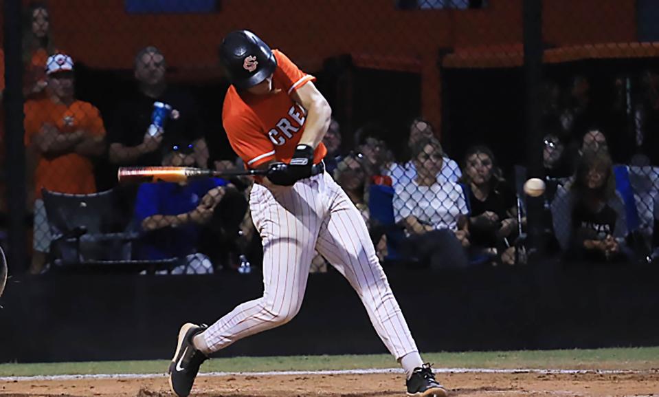 Lucas Badalato (10) hits the ball against Bartram Trail in the Region 1-7A quarterfinals hosted by Spruce Creek High School on Tuesday, May 7, 2024.