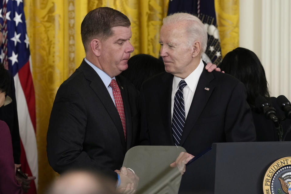 President Joe Biden shakes hands with outgoing Sec. of Labor Marty Walsh, during a ceremony announcing his nomination of Julie Su to serve as the Secretary of Labor during an event in the East Room of the White House in Washington, Wednesday, March 1, 2023. (AP Photo/Susan Walsh)