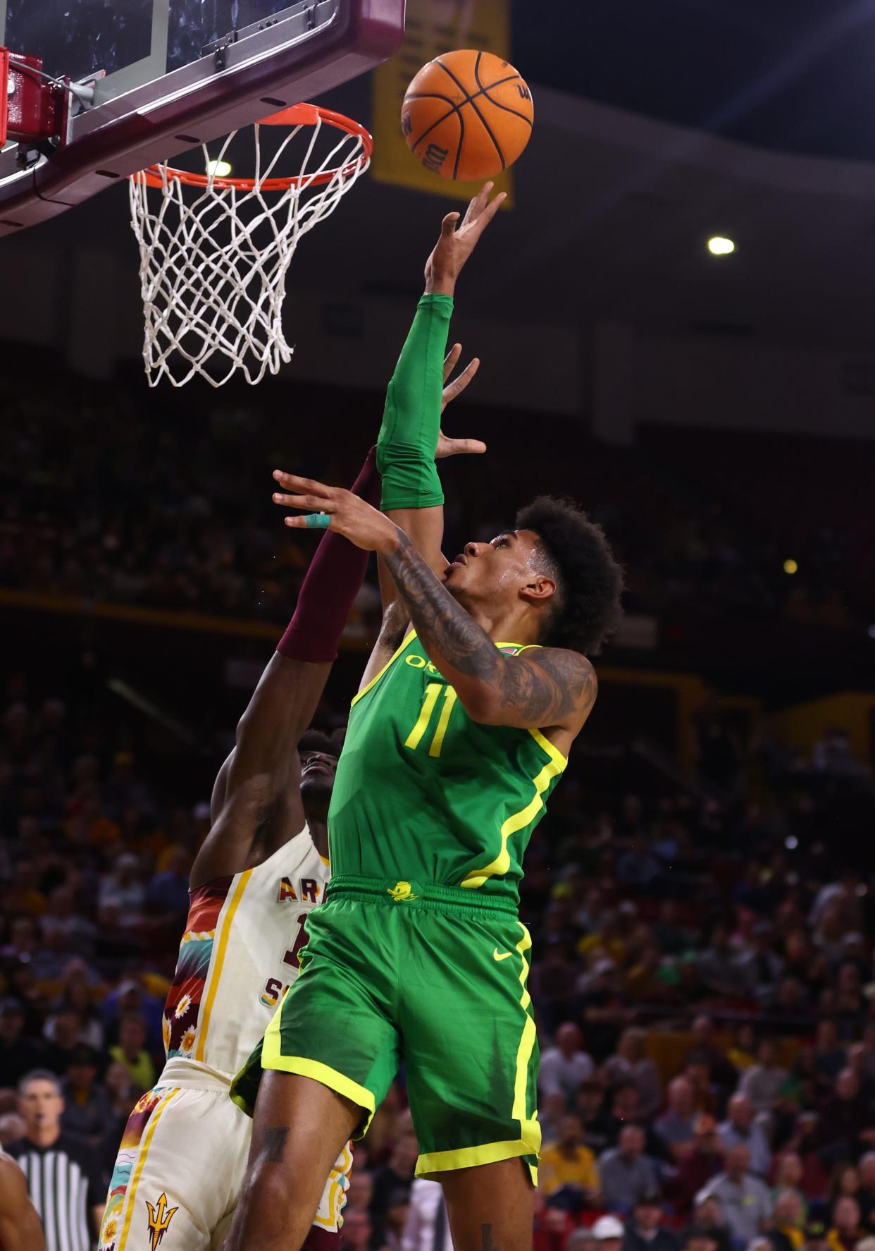 Oregon Ducks guard Rivaldo Soares (11) goes to the basket against the Arizona State Sun Devils in the first half at Desert Financial Arena Feb. 4, 2023, in Tempe, Arizona.