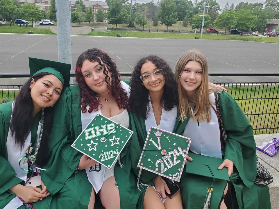 Dover High School graduating seniors Alexis Huff, left, Jordan Blier, Vanessa Petifort and Julia Clough are excited to graduate but say they will miss their friends. They are seen at commencement Thursday, June 6, 2024 at the Whittemore Center in Durham.