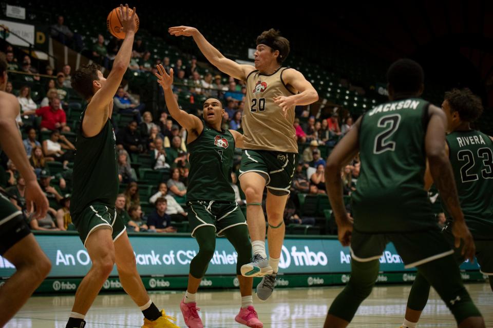 Colorado State basketball player Joe Palmer passes the ball during the CSU men's basketball Homecoming scrimmage in Moby Arena on Saturday, Oct. 15, 2022, in Fort Collins, Colo.