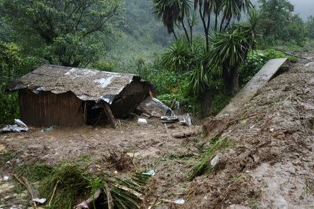 A view of the house where three members of a family died after a mudslide following heavy showers caused by the passing of Tropical Storm Earl in the town of Temazolapa, in Veracruz state, Mexico, August 6, 2016. REUTERS/Oscar Martinez