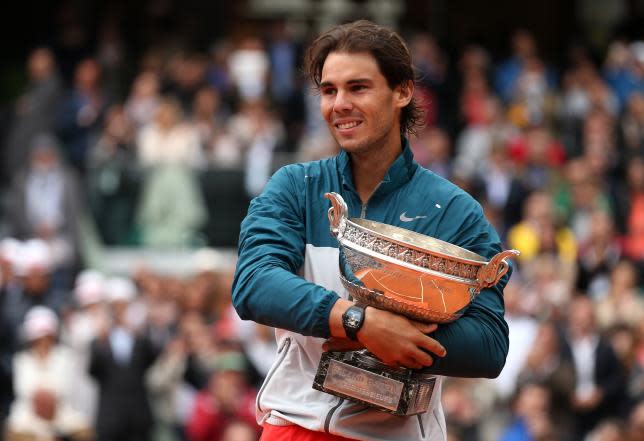 Rafael Nadal beat Spain's David Ferrer in straight sets to make history in Paris.