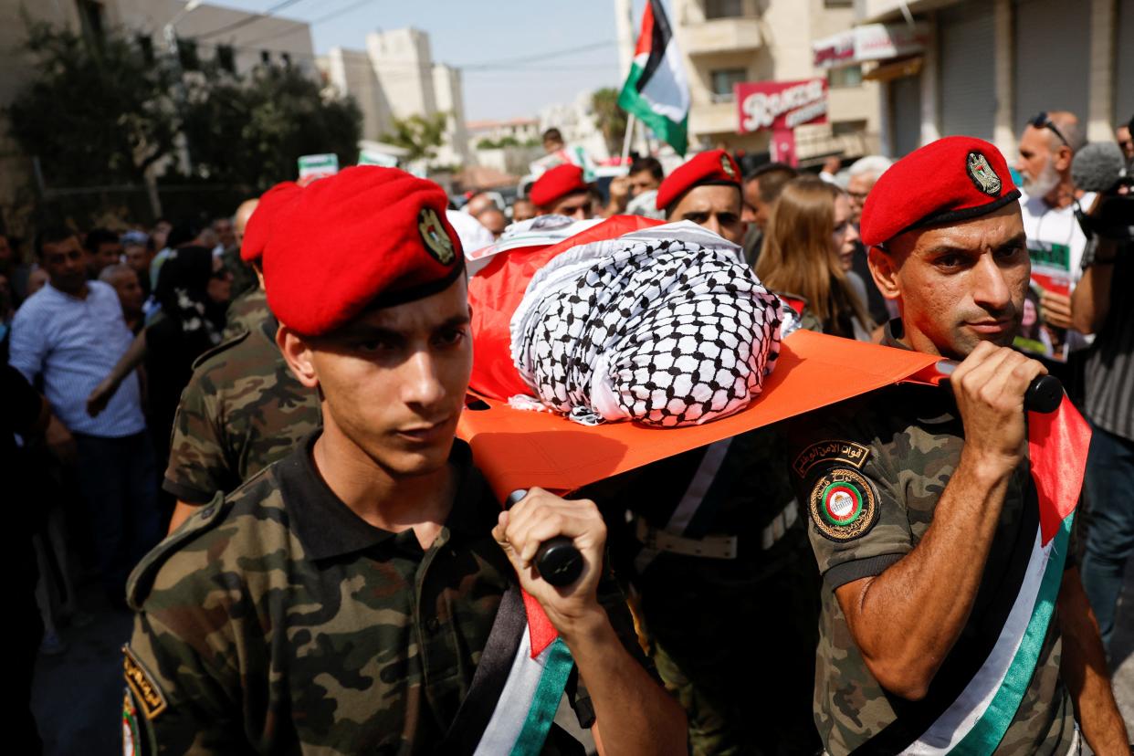 Palestinian security forces carry the body of Turkish-American activist Aysenur Ezgi Eygi, during a procession honoring her, after she was shot dead by Israeli forces, in Nablus, in the Israeli-occupied West Bank September 9, 2024.