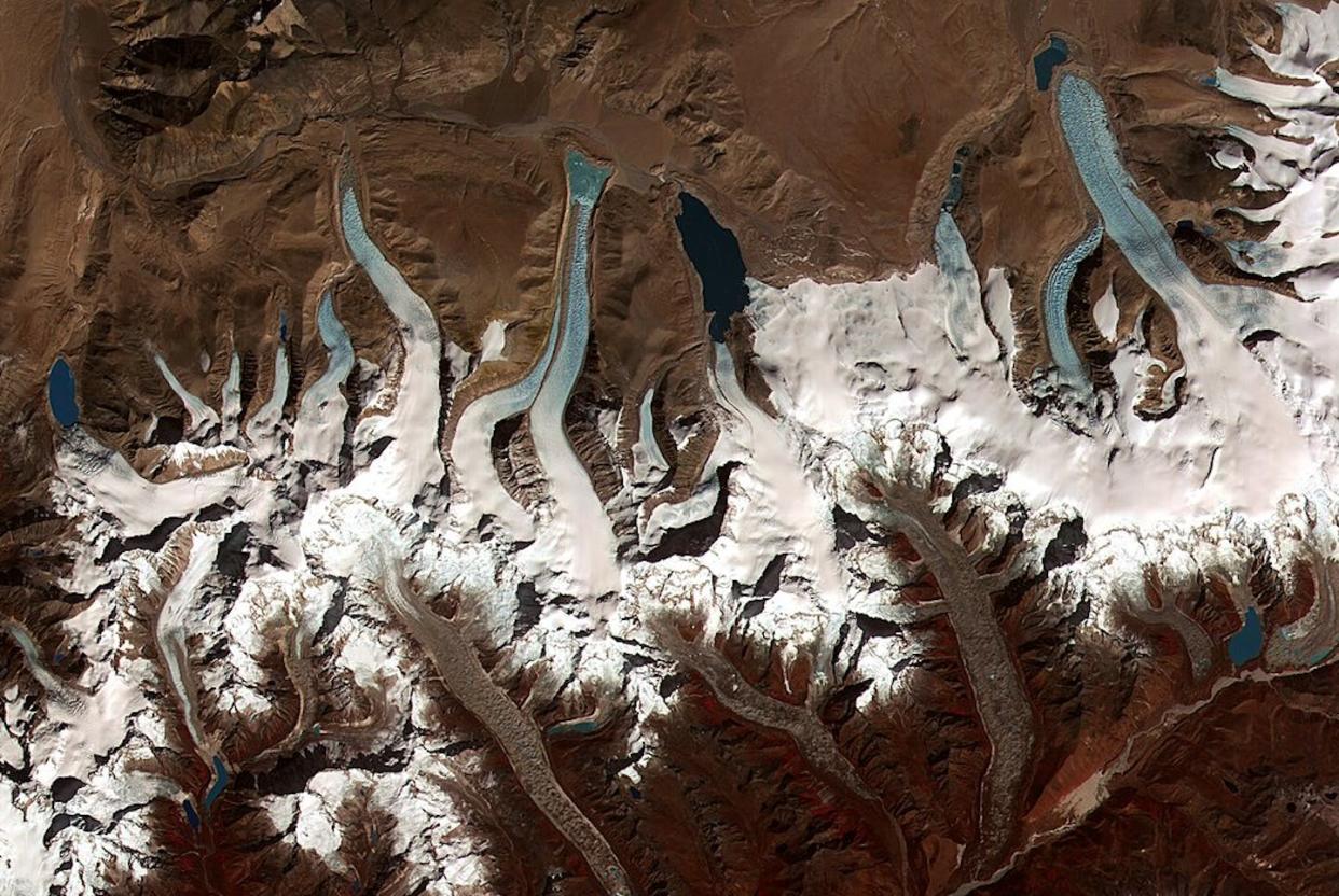 Glacial lakes are common in the Himalayas, as this satellite view shows. Some are dammed by glaciers, other by moraines. <a href="https://en.wikipedia.org/wiki/Lakes_of_Bhutan#/media/File:Glacial_lakes,_Bhutan.jpg" rel="nofollow noopener" target="_blank" data-ylk="slk:NASA;elm:context_link;itc:0;sec:content-canvas" class="link ">NASA </a>