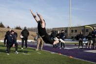 UW Whitewater lineman Quinn Meinerz jumps at the school's pro football day Tuesday, March 9, 2021, in Whitewater, Wisc. The only FCS teams hosting pro days this year were Central Arkansas, North Dakota State and South Dakota State. Division III Wisconsin-Whitewater held one only because its Senior Bowl revelation, offensive lineman Quinn Meinerz, warranted another look after his team did not play in the fall. (AP Photo/Morry Gash)