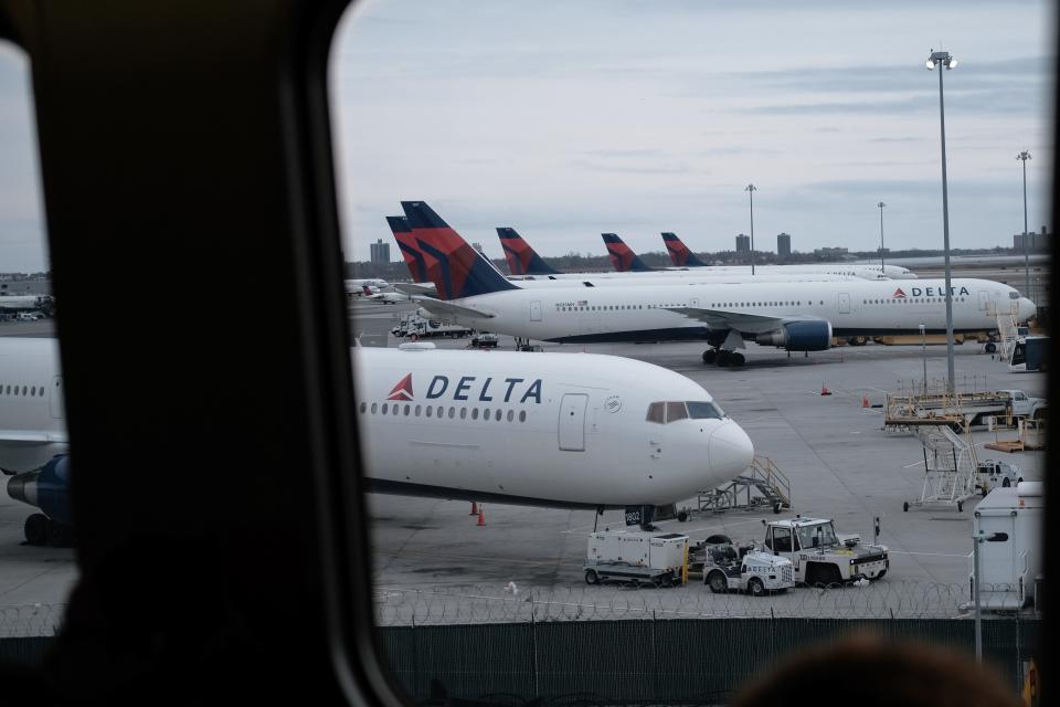 Delta Air Lines says one of its flights returned to the terminal after a passenger told the crew they had been exposed to someone with coronavirus.