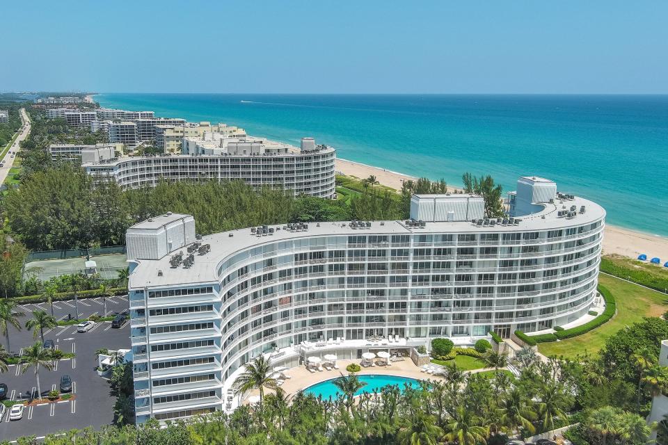 With its curved silhouette, the oceanfront Ambassador II is near the bridge that connects Palm Beach to Lake Worth Beach.