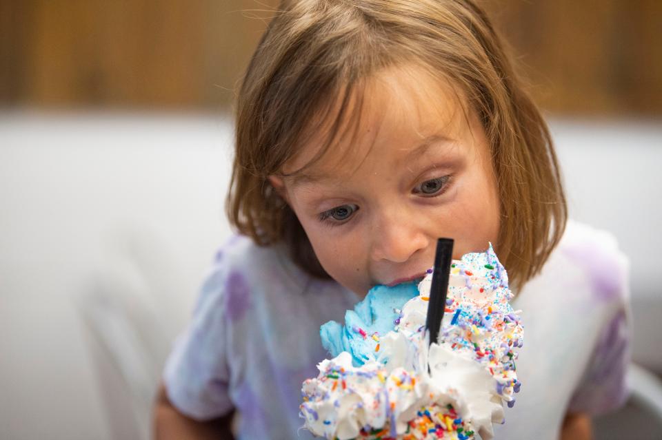 Lily Steineger digs into a milkshake at Legendairy Milkshake Bar in Nashville.