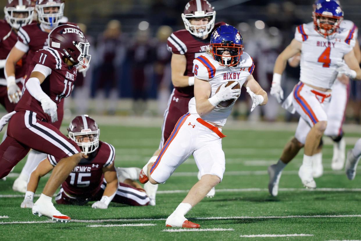 Bixby's Jett Turner carries the ball during the Class 6A-1 high school football championship game between Bixby and Jenks at Chad Richison Stadium in Edmond, Okla., Friday, Dec. 1, 2023.