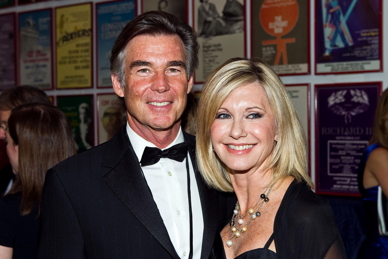 Olivia Newton-John and her husband, John Easterling, attend Honoring The Promise, celebrating the 30th anniversary of the Promise at The John F. Kennedy Center for Performing Arts, on Oct. 16, 2010, in Washington, D.C. (Paul Morigi / WireImage via Getty Images)