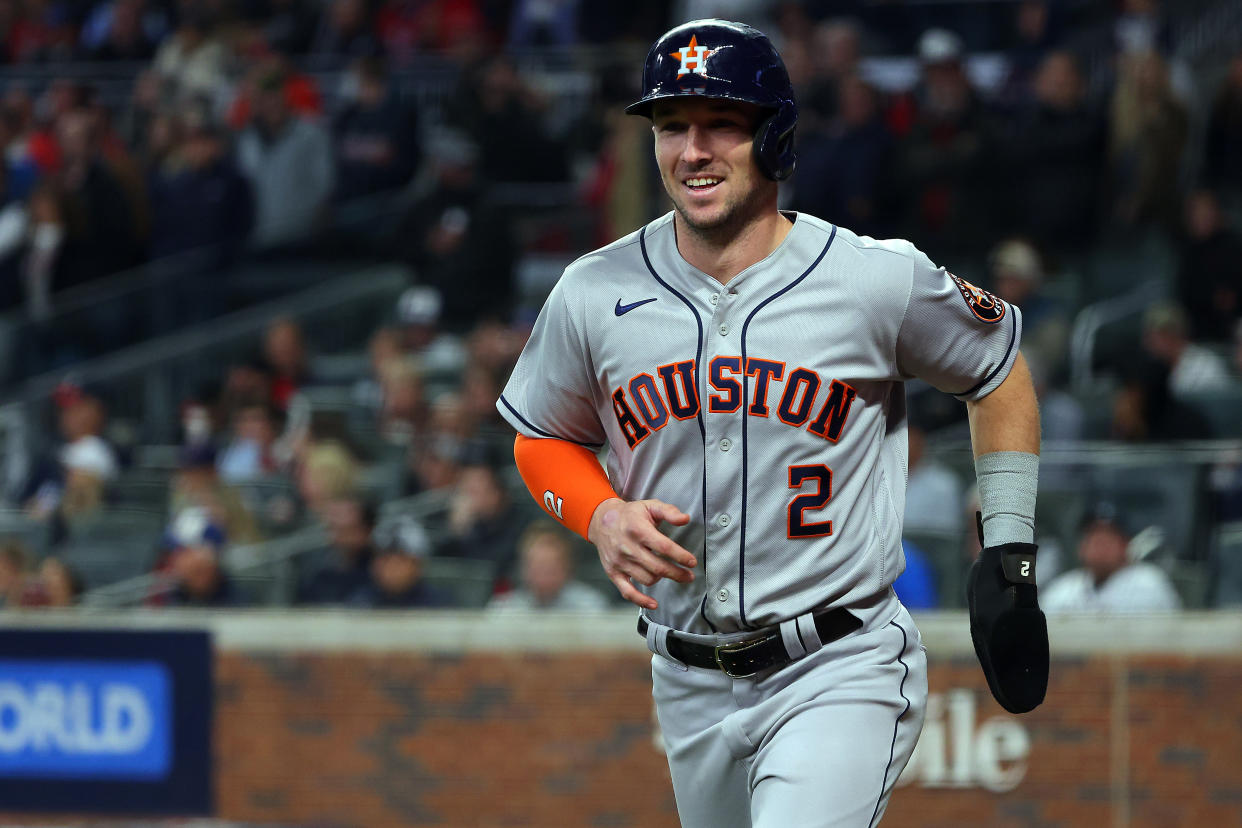 ATLANTA, GEORGIA - OCTOBER 31:  Alex Bregman #2 of the Houston Astros reacts after scoring a run against the Atlanta Braves during the fifth inning in Game Five of the World Series at Truist Park on October 31, 2021 in Atlanta, Georgia. (Photo by Kevin C. Cox/Getty Images)