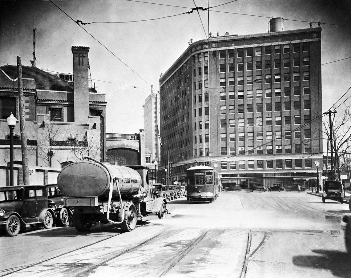 Looking east on 7th St., downtown Fort Worth; City of Fort Worth fire truck and trolley car; Neil P. Anderson building in background, ca. 1920s