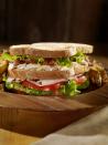 <p>This sandwich offers toasted white bread, classic chicken salad, crisp bacon, crunchy lettuce, and juicy tomato. What else could you want?</p><p><strong><a href="https://www.countryliving.com/food-drinks/recipes/a1691/clubhouse-sandwich-3815/" rel="nofollow noopener" target="_blank" data-ylk="slk:Get the recipe for Club Sandwich;elm:context_link;itc:0;sec:content-canvas" class="link ">Get the recipe for Club Sandwich</a>.</strong></p>