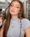 <p>Hadid gave plaits a new twist (sorry not sorry) for her 26th birthday by bubble braiding the two front strands of her recently <a href="https://www.elle.com/uk/beauty/hair/g33346168/copper-hair/" rel="nofollow noopener" target="_blank" data-ylk="slk:copper;elm:context_link;itc:0;sec:content-canvas" class="link ">copper</a>-toned hair. We're not sure the model's hair could be any more on trend right now.</p>