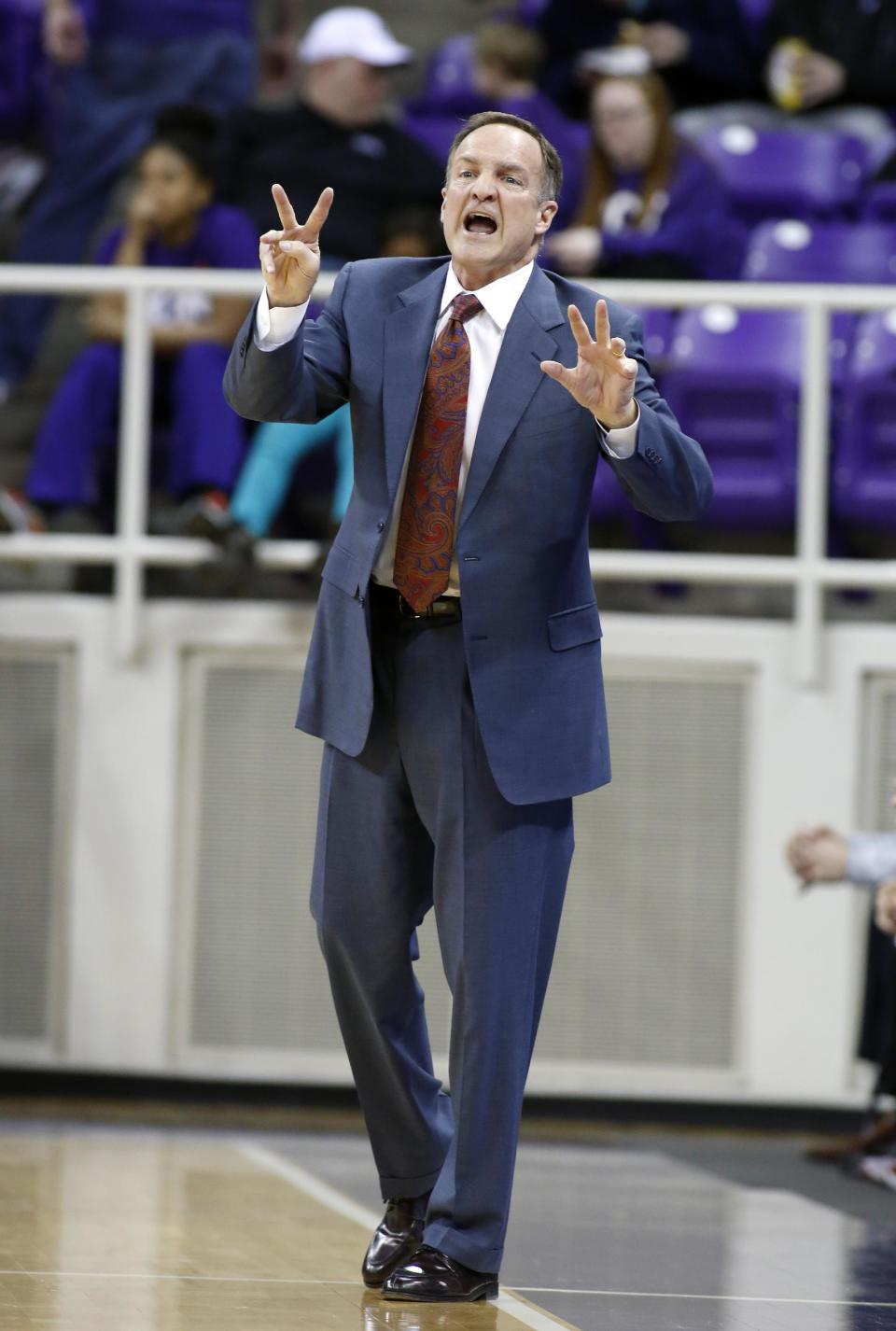 Oklahoma head coach Lon Kruger calls a play in the first half of an NCAA basketball game against TCU Saturday, March 8, 2014, in Fort Worth, Texas. Oklahoma won 97-67. (AP Photo/Sharon Ellman)