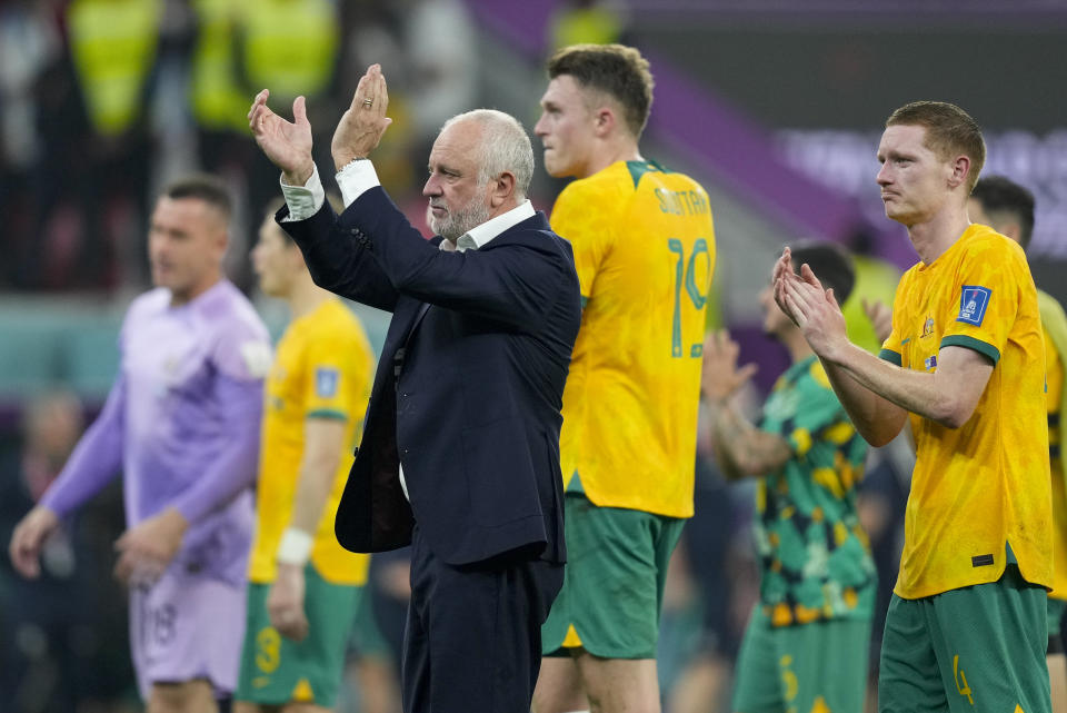 Australia's head coach Graham Arnold gestures to supporters following the World Cup round of 16 soccer match between Argentina and Australia at the Ahmad Bin Ali Stadium in Doha, Qatar, Saturday, Dec. 3, 2022. (AP Photo/Jorge Saenz)