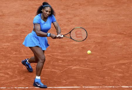 Tennis - French Open - Roland Garros - Serena Williams of the U.S v Kristina Mladenovic of France - Paris, France - 28/05/16. Williams returns a shot. REUTERS/Jacky Naegelen